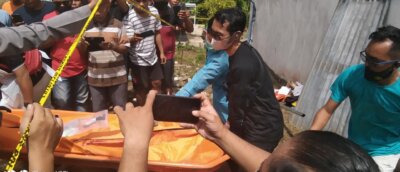 LOKASI KEJADIAN : Suasana di sekitar gedung walet milik Mahyudin, setelah ditemukan mayat seorang pria tak dikenal di Kelurahan Beriwit, Kecamatan Murung, Kabupaten Murung Raya, Jumat (18/6)./DADANG