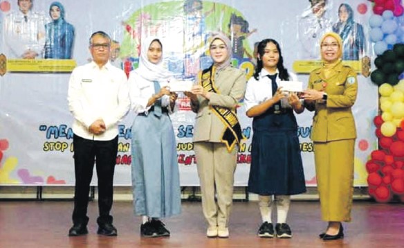 HADIR: Sekda Lamandau, M Irwansyah menghadiri kegiatan peringatan Hari Anak Nasional, di GPU Lantang Torang, Senin (21/07).