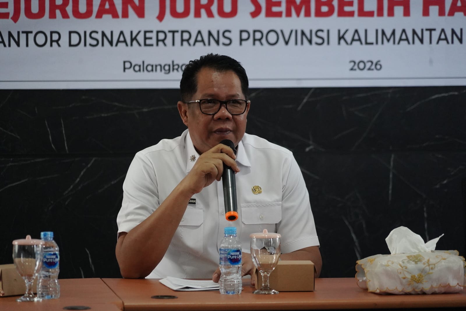 Plt. Asisten Perekonomian dan Pembangunan Setda Provinsi Kalimantan Tengah, Darliansjah, saat membacakan sambutan
