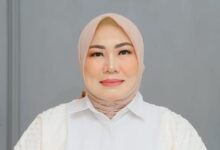 Lurah Panarung, Evi Kahayanti.