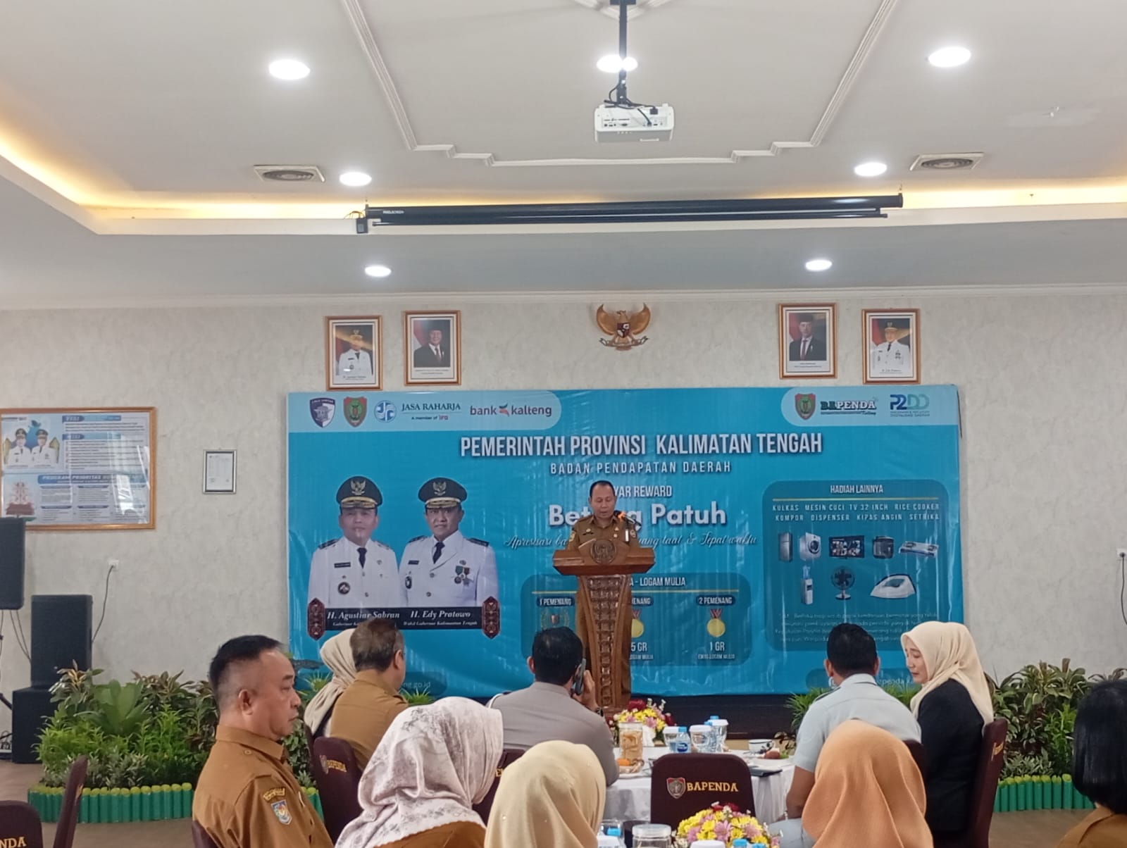 ‎Kepala Bapenda Kalteng, Sutoyo saat membacakan sambutan dalam kegiatan